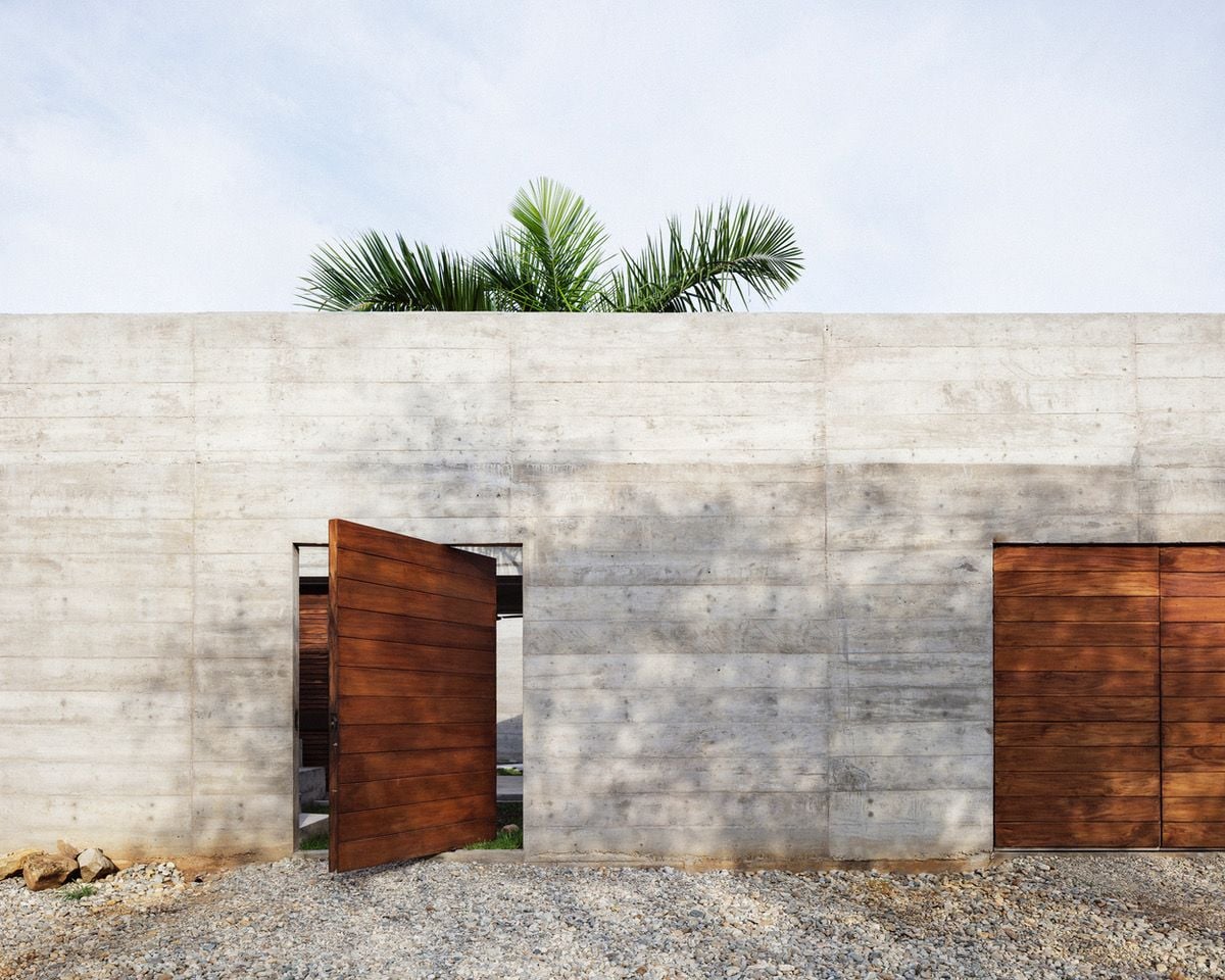From the outside, the Zicatela House looks like little more than an unforgiving concrete bunker.