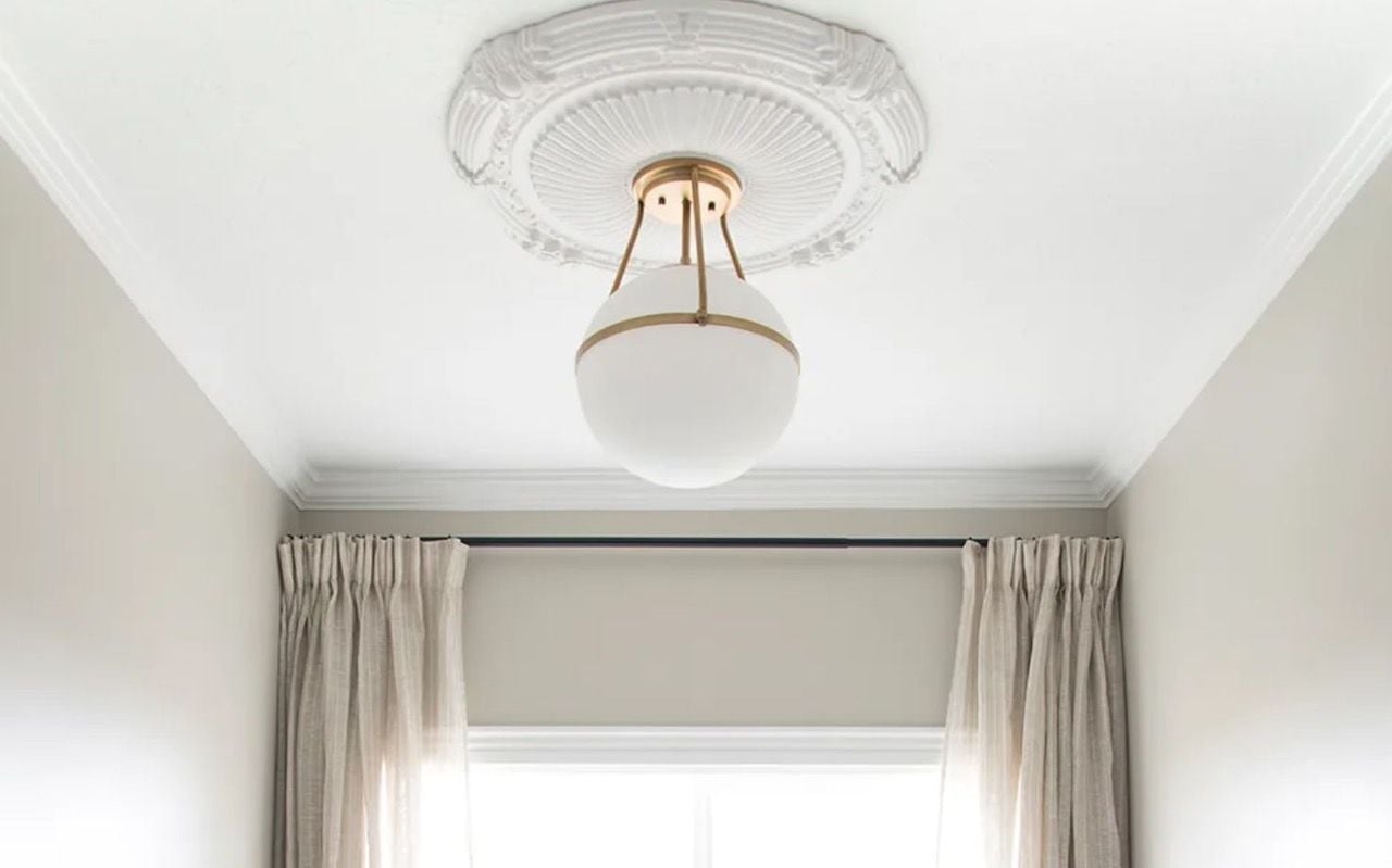 DIY ceiling medallion instantly adds class to the room it's in. 