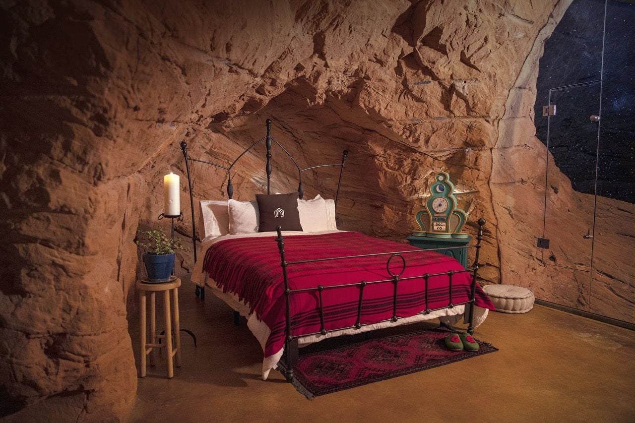 Festive-feeling bedroom inside Vacasa's Grinch's Lair rental in Boulder, Utah.