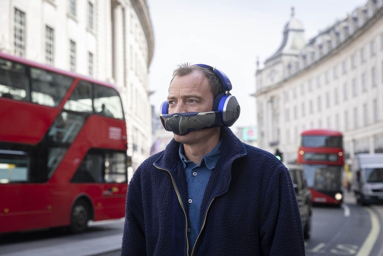 Man sports a pair of Dyson Zone air purifying headphones.