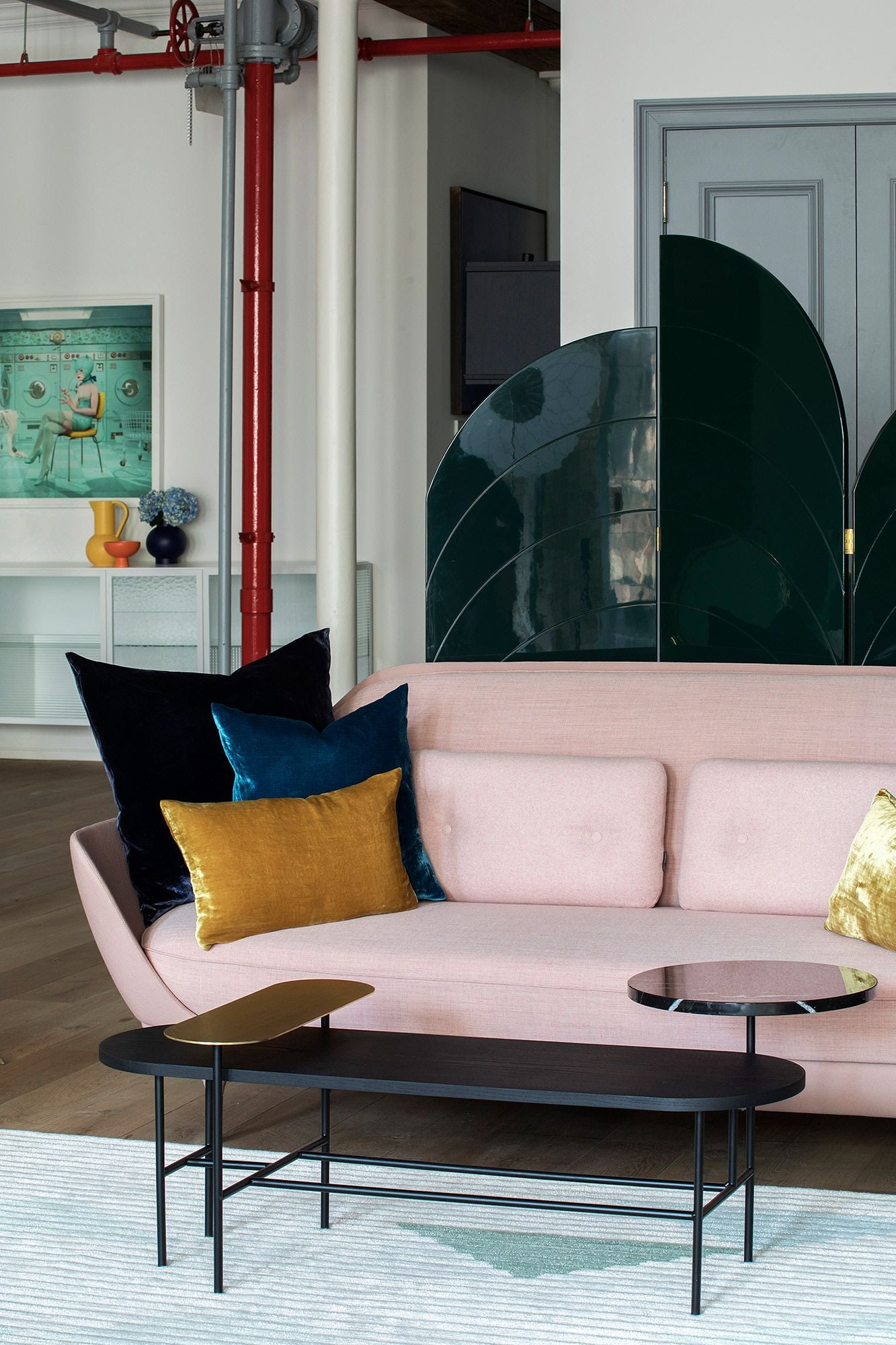 Soft pastel furnishings adorn the interiors of STUDIOLAV's new NYC loft