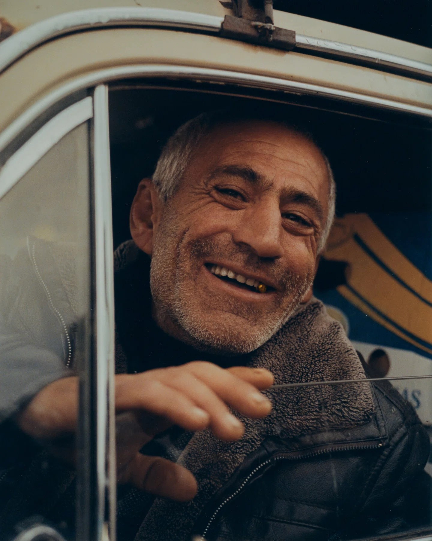Smiling Armenian Man in his Soviet-era Lada car, photographed by Alex Nazari.
