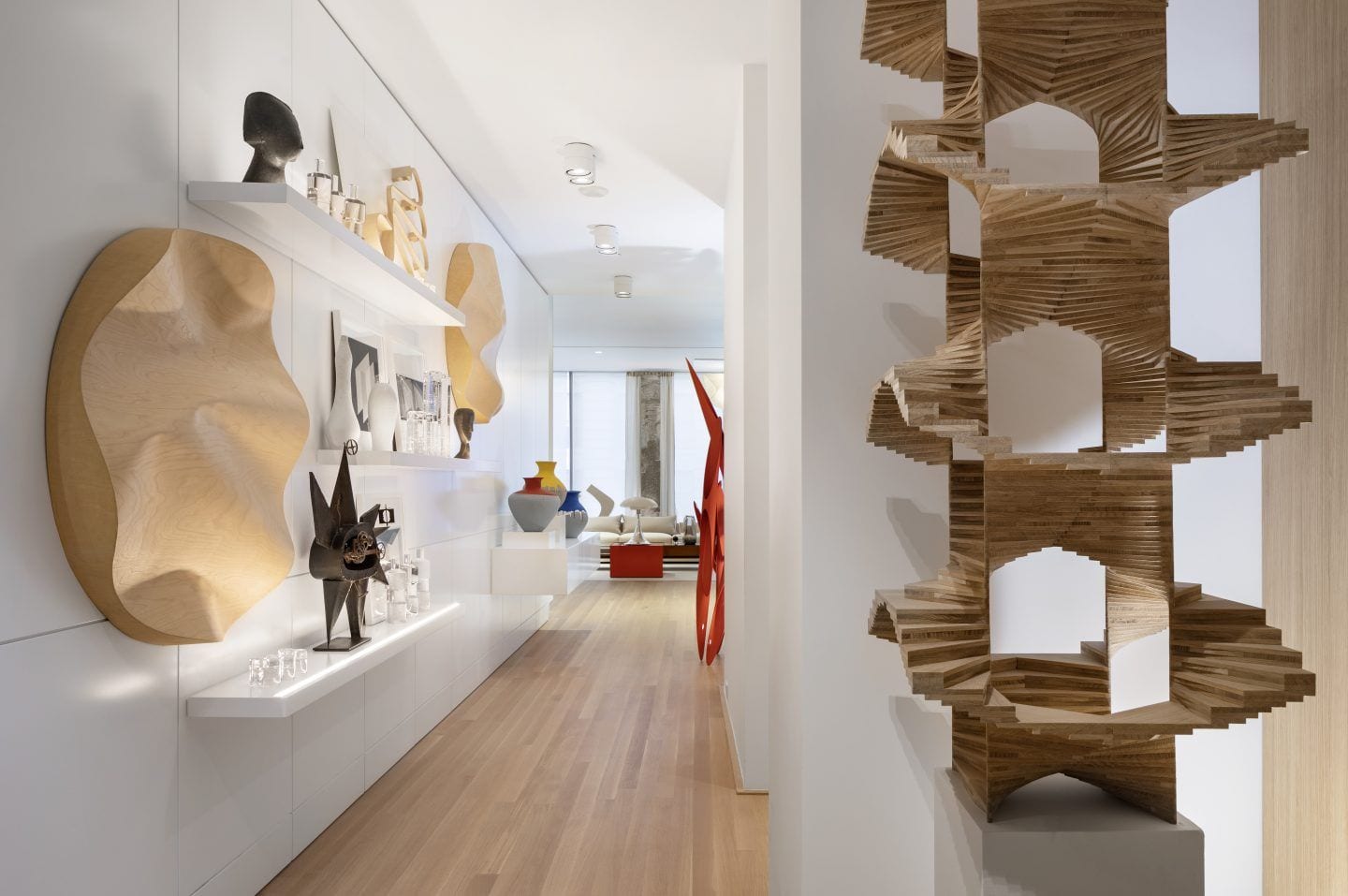 A hallway filled with sculptures inside architect Lee Mindel's luxury New York City apartment. 