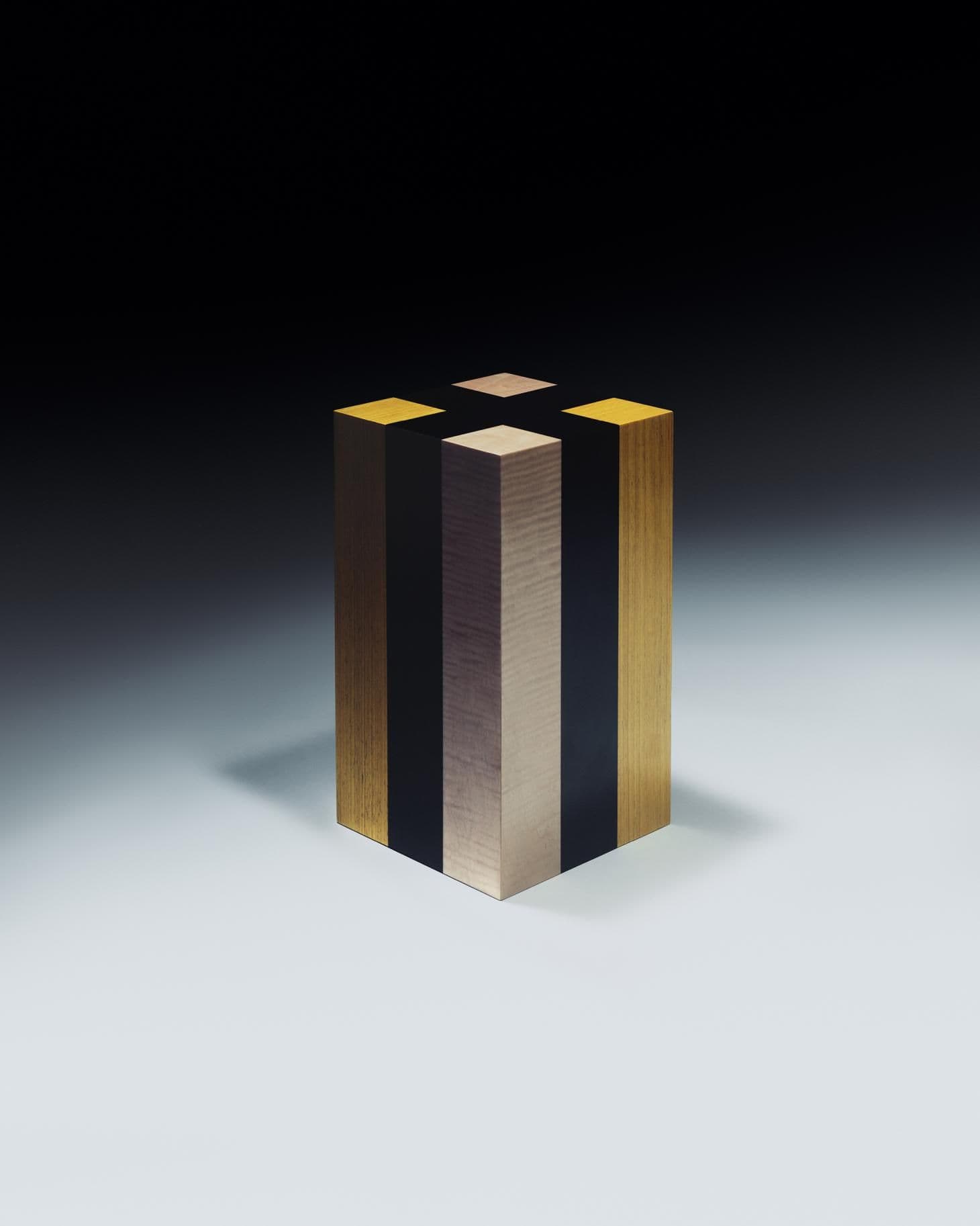 A golden steel stool featured in Jonathan Saunders' debut furniture collection. 
