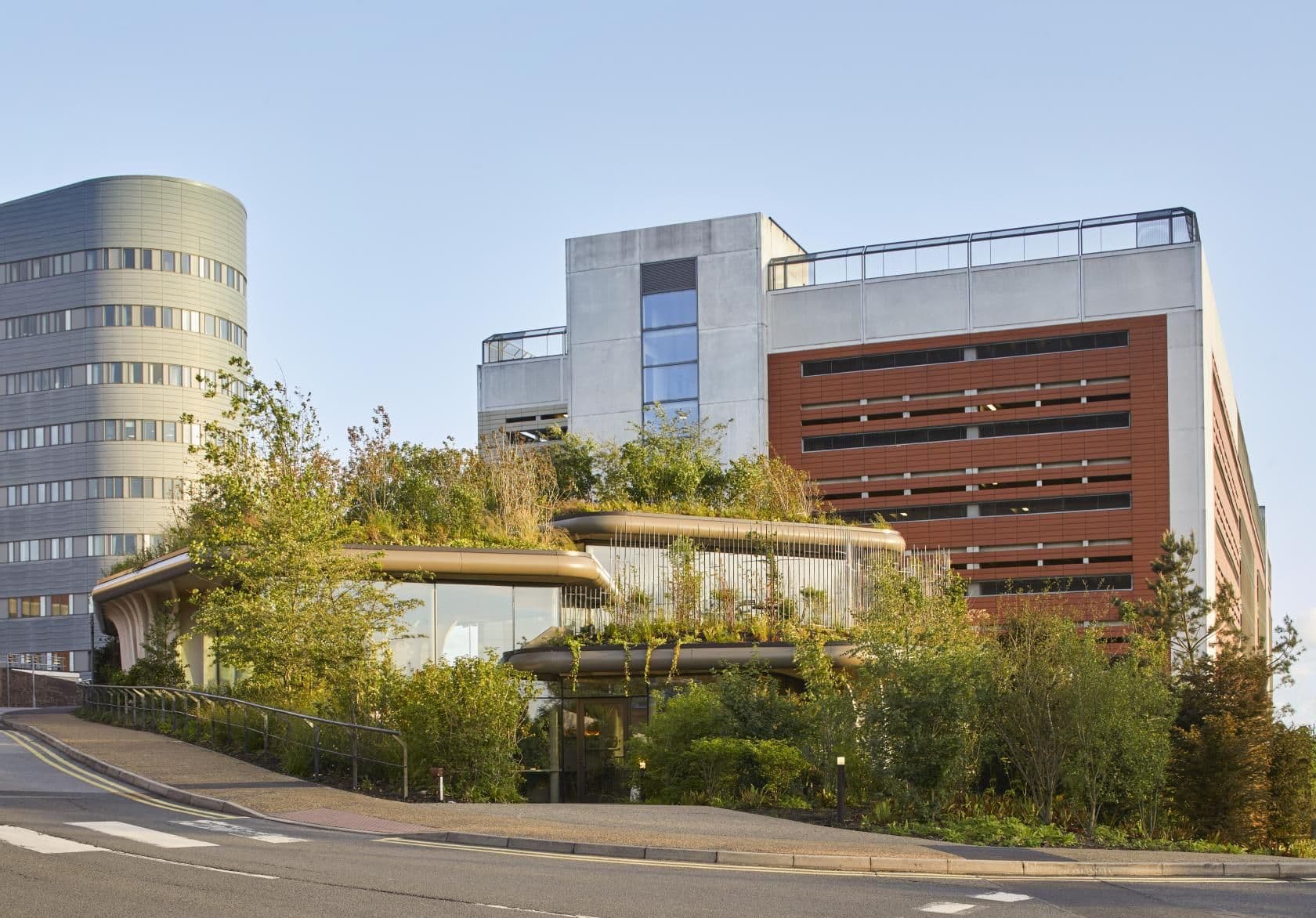 Health Center by Thomas Heatherwick Designed as Three Massive Planters