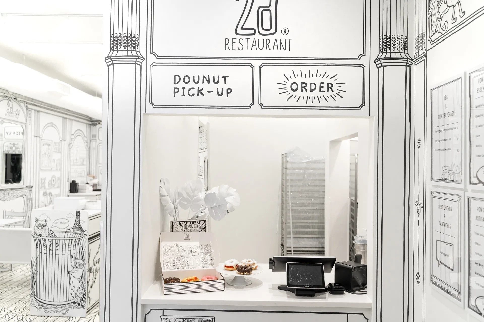 Adorable black and white doughnut pick-up kiosk at the 2D Café Chicago.