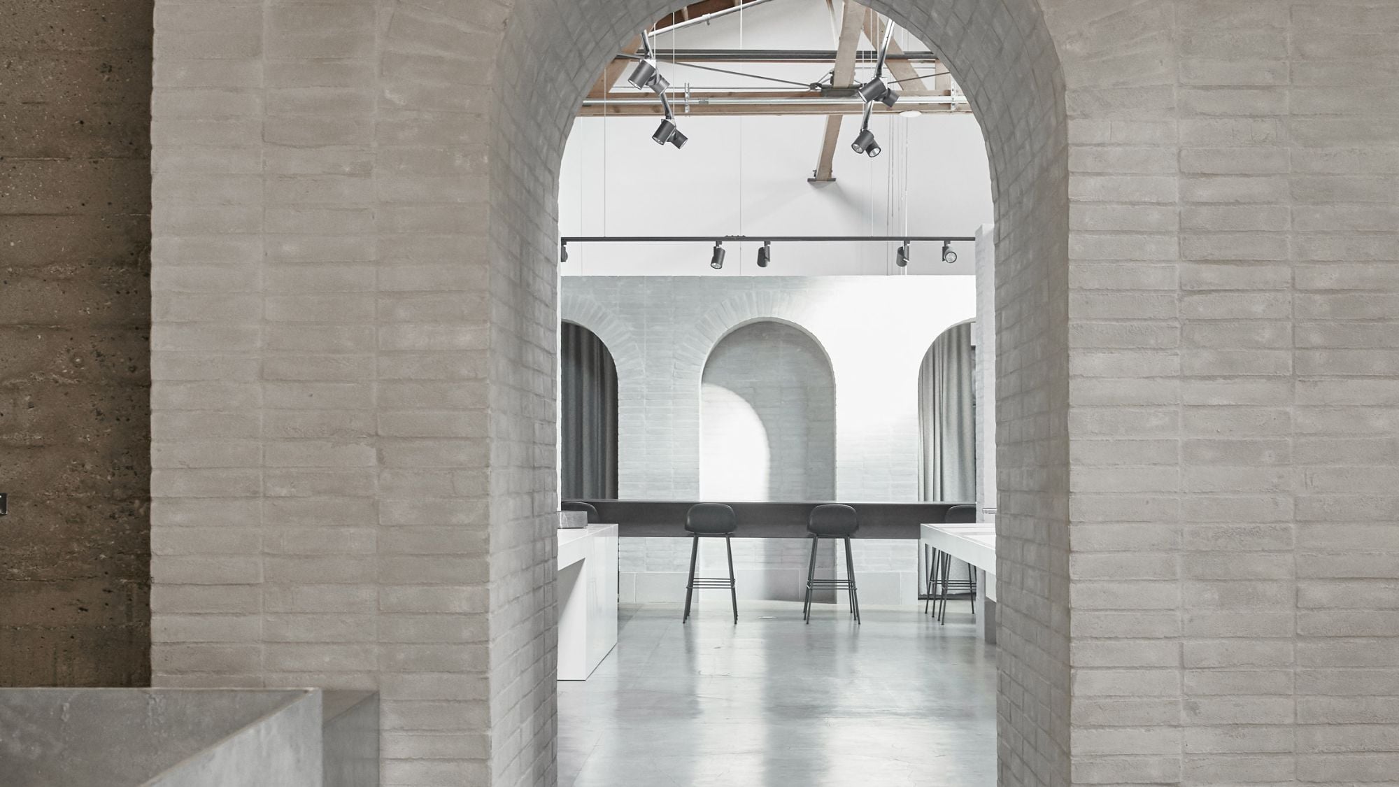 The Splash Lab's new Culver City Showroom makes extensive use of arches and marble for a distinctly church-like feel.