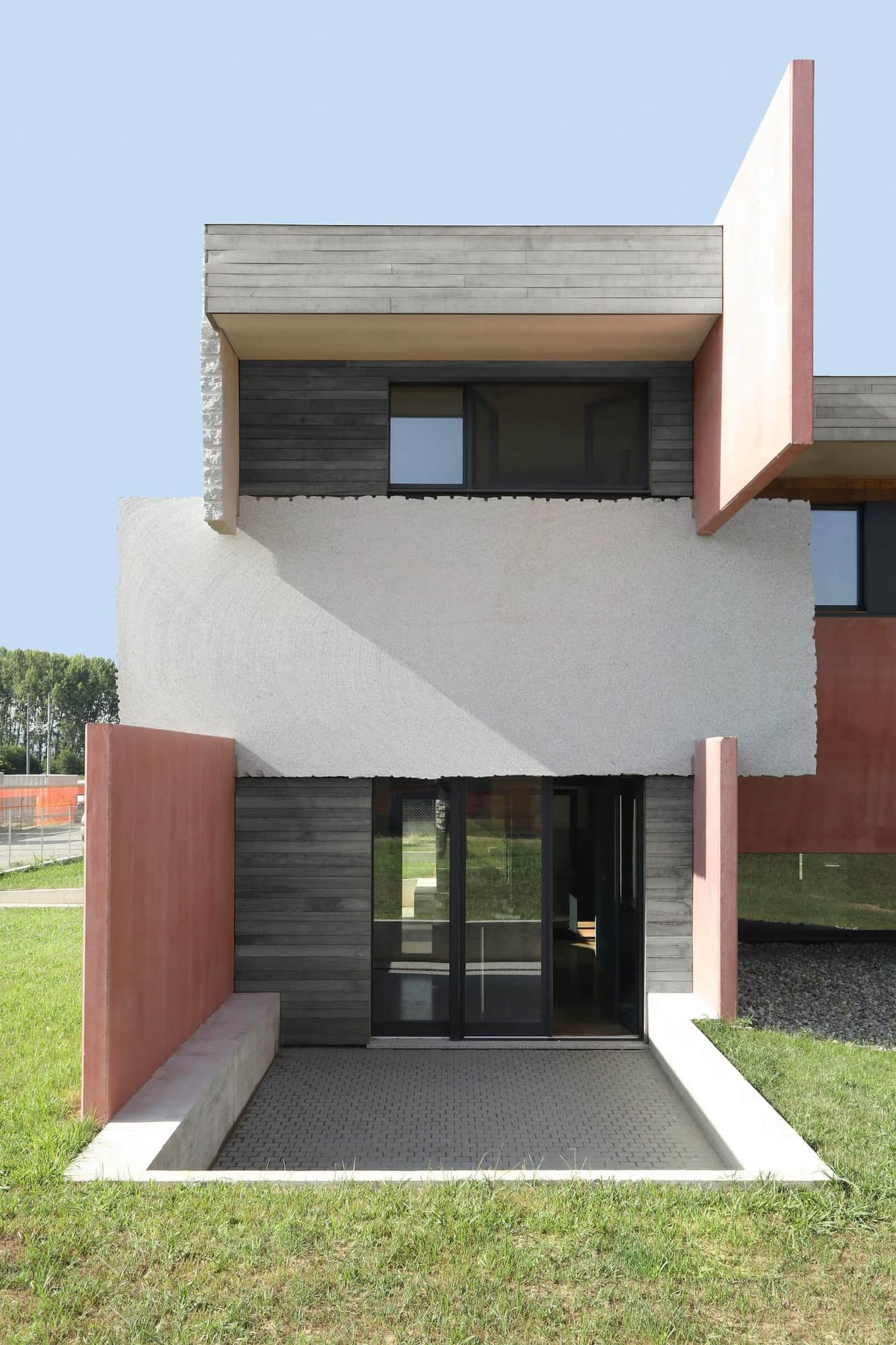 Zoomed-out view of the modern entryways leading into Italy's two 