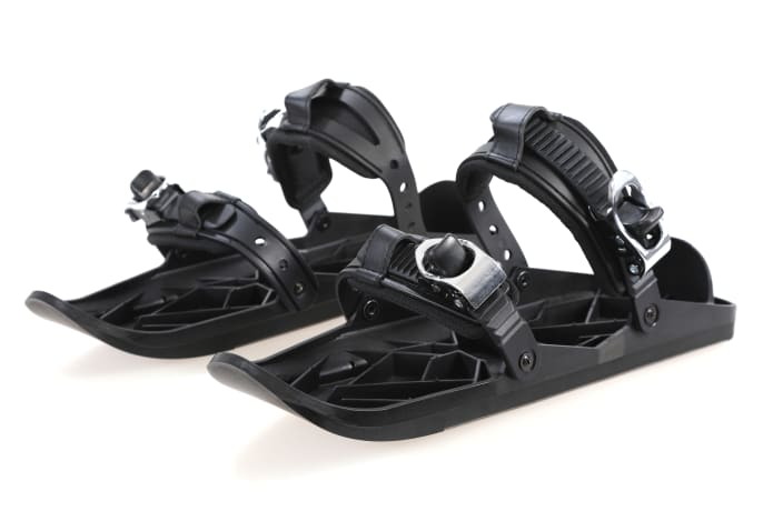 Snowfeet, the compact new ski attachments for your winter boots.