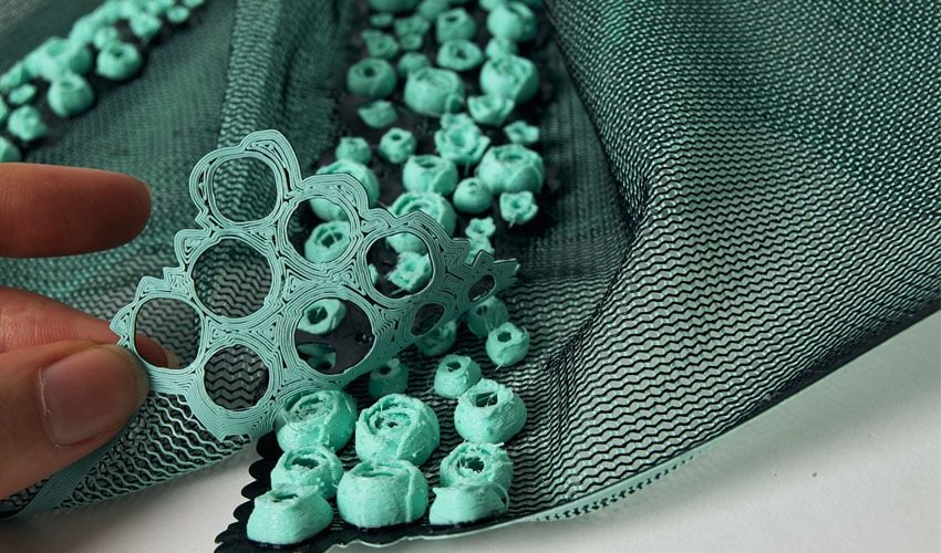 Close-up view of the plastic-based material used to 3D print garments from the Resilience Project. 