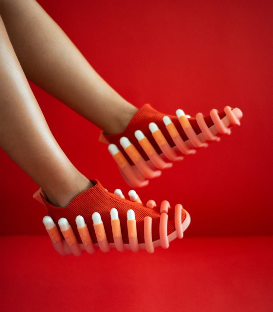 This quirky red shoe featured in Netha Goldberg's NETINA collection features 12 ports for different-sized tampons.