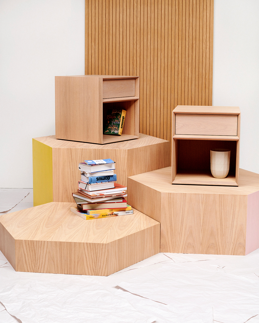 Stackable timber stands and storage pieces featured in Oku Space's debut furniture collection.
