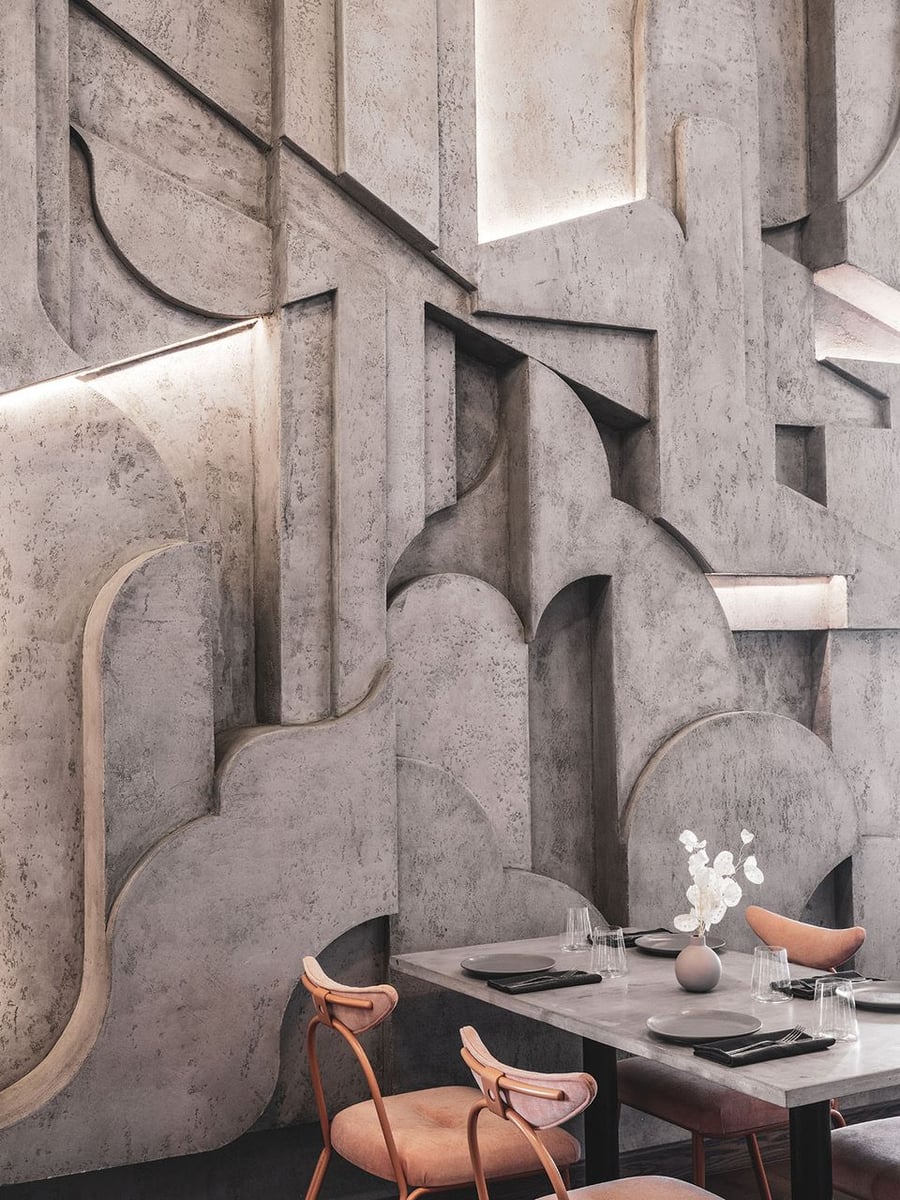 Constructivist concrete walls like this one give the Café Polet an added textural edge. 