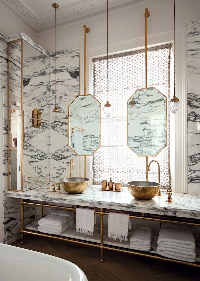 Bold marble patterns like these bring elegance and visual interest to any bathroom they're in.