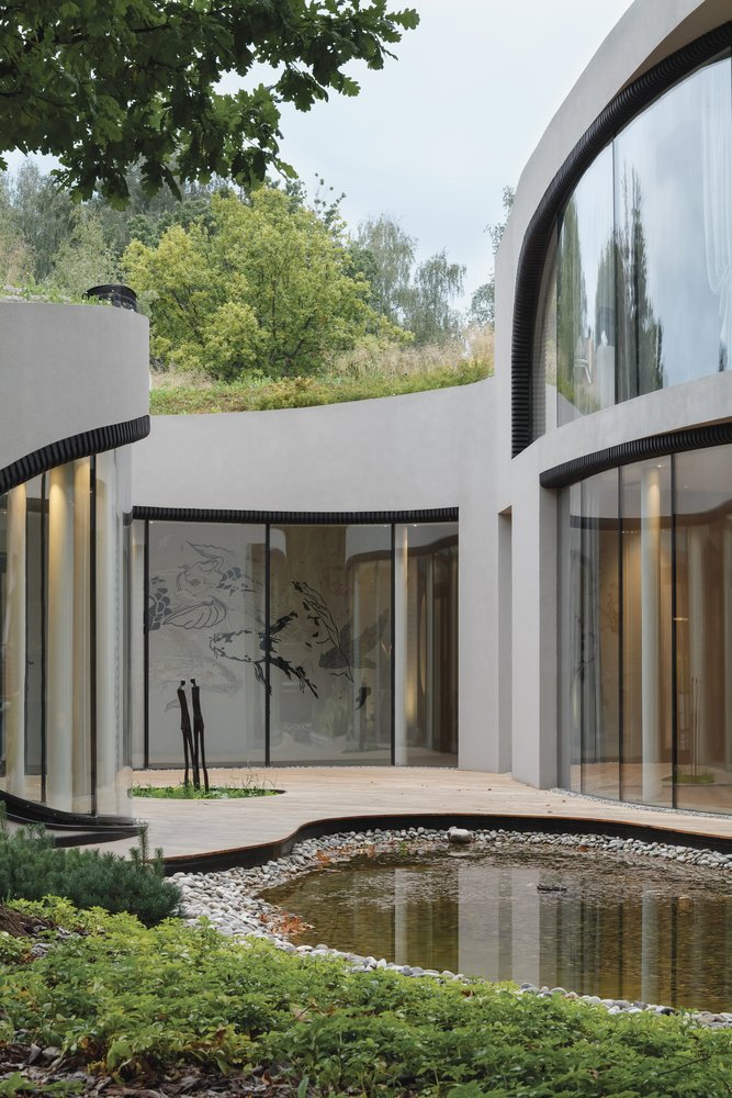 Several natural elements make up the landscape around Niko Architect's latest project