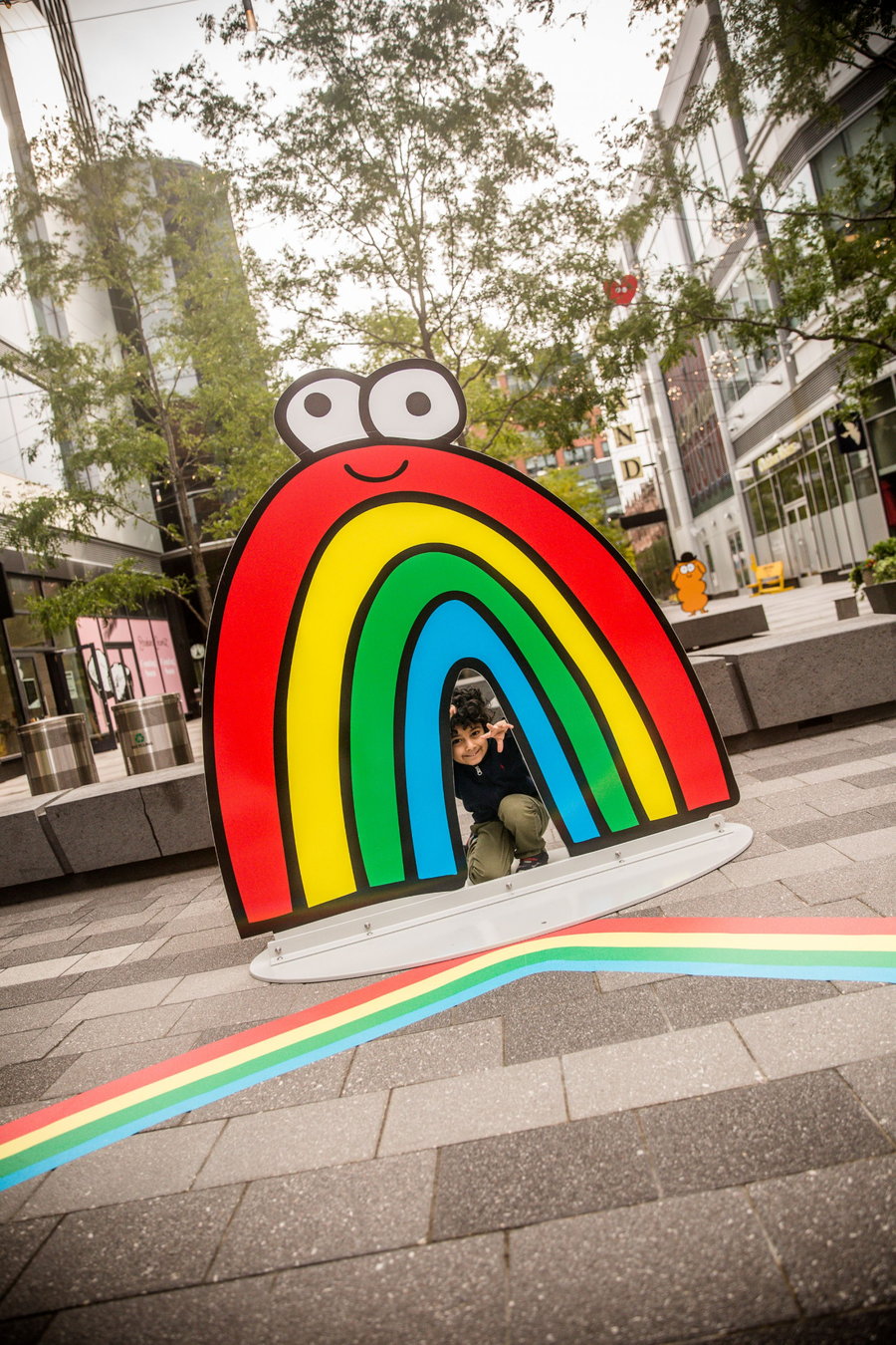 Warm-hearted doodles from artist Jon Burgerman are brought to life in the Boston Seaport's new 