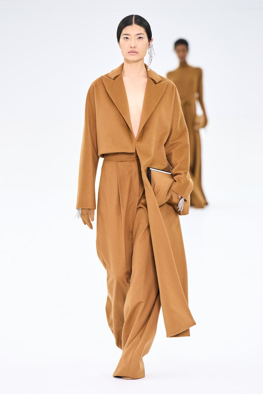 Oversized pantsuit by Fendi at Paris Fashion Week 2022.