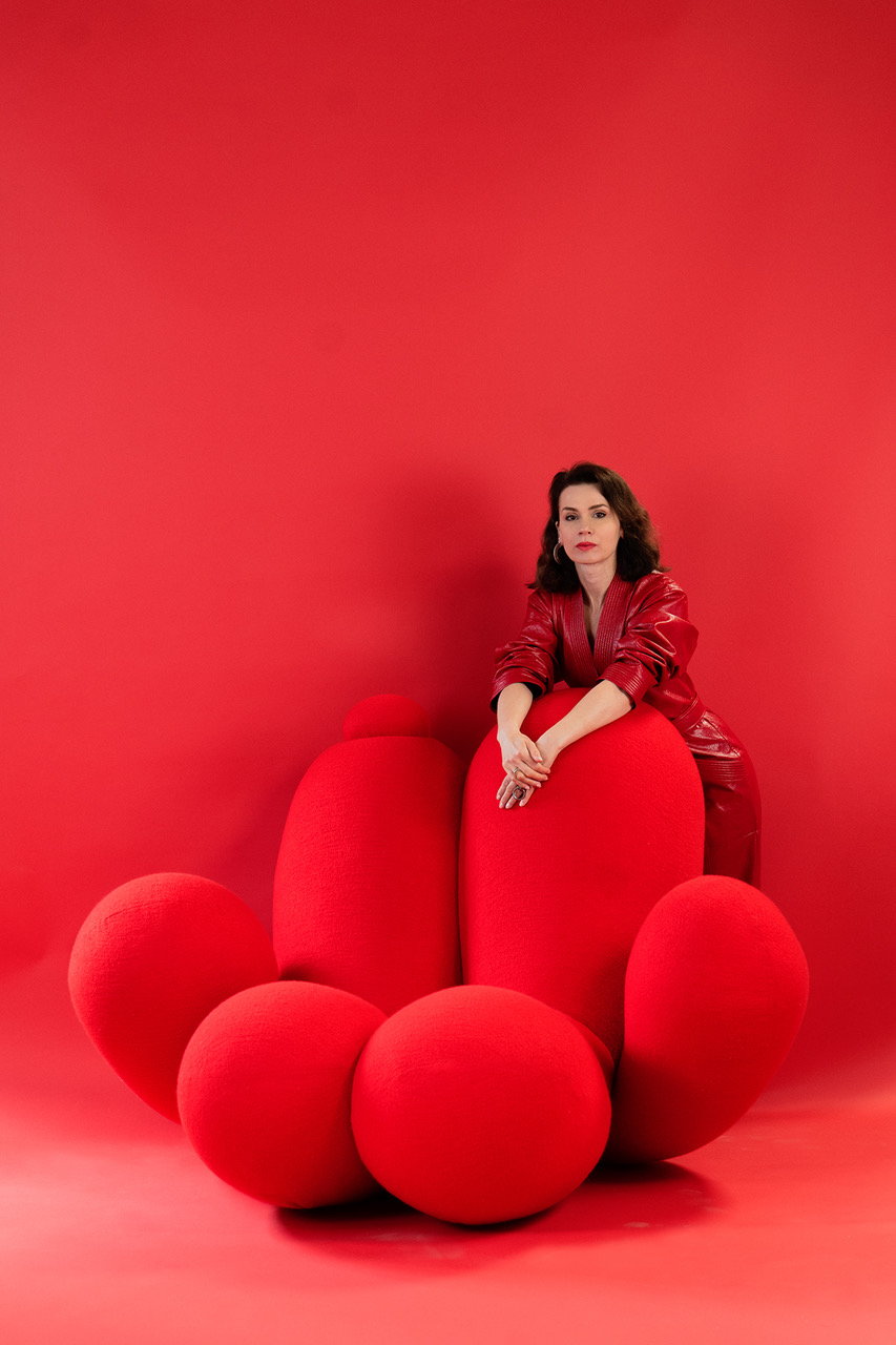 Bonhinc Studio founder Lara Bohinc poses with a curvy chair from her new 
