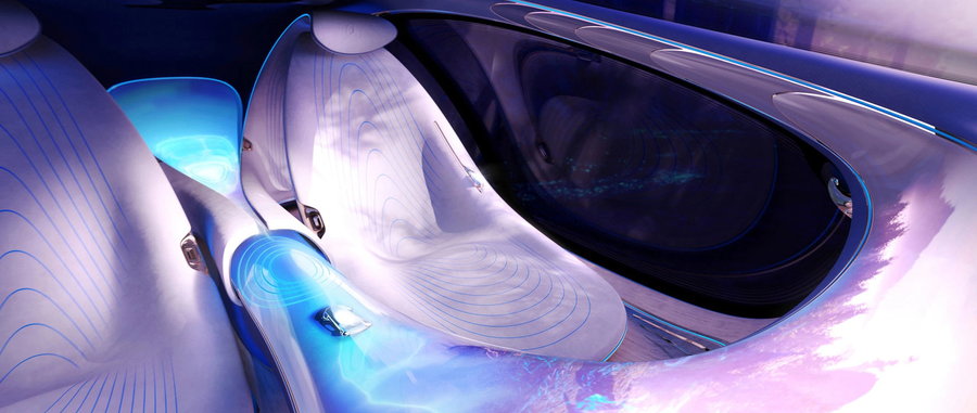 The front seat and large illuminated display of the Merceds-Benz VISION AVTR concept car.