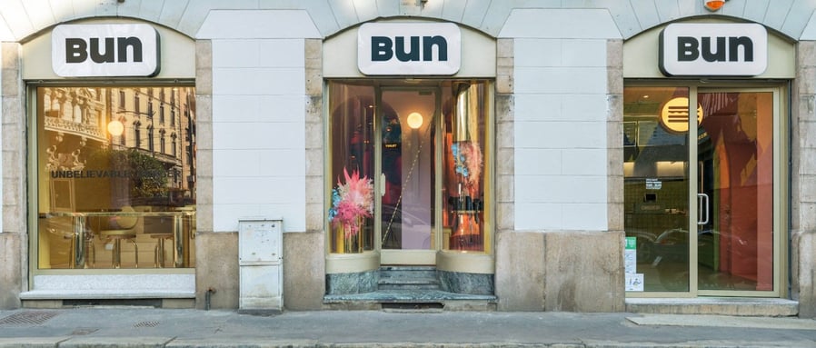 Deceptively simple exterior of the Masquespacio-designed Bun burger restaurant on Milan's Via Dell'Orso.