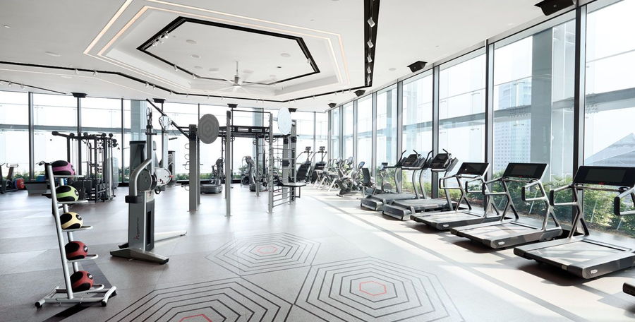 New hotels like the Shangri-La at the Fort are teeming with high-tech fitness facilities like this one.
