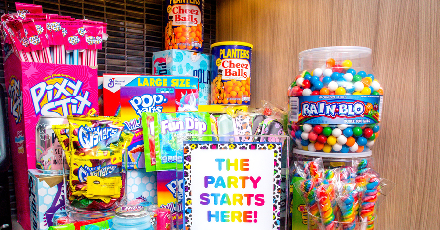 The Lisa Frank Flat's kitchen is fully stocked with classic 90s candy 