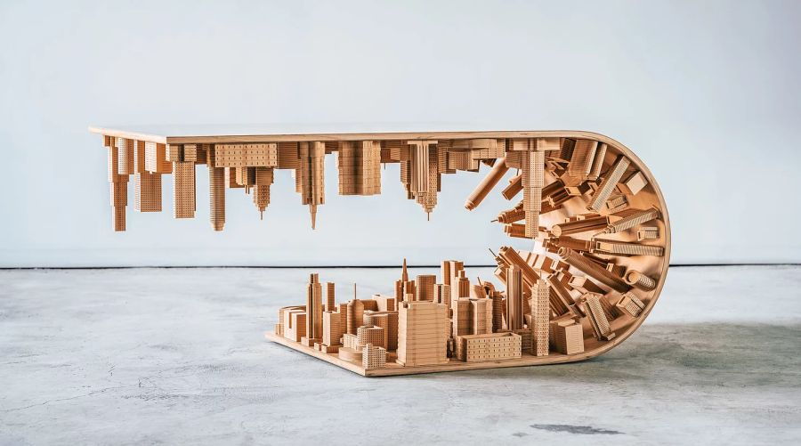 Mousarris Design Studio's Wave City Coffee Table sees a cityscape folded upwards over itself, much like in the 2010 hit film 