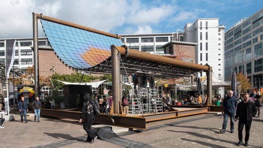 Side view of the colorful solar pavilion designed by Marjan van Aubel and V8 Architects for at Dutch Design Week 2022.
