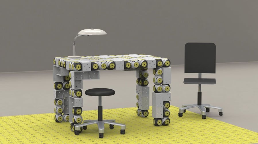 A large desk made from Roombot modules. 