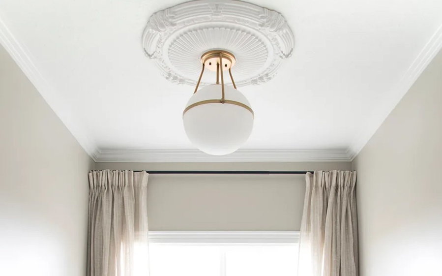 DIY ceiling medallion instantly adds class to the room it's in. 