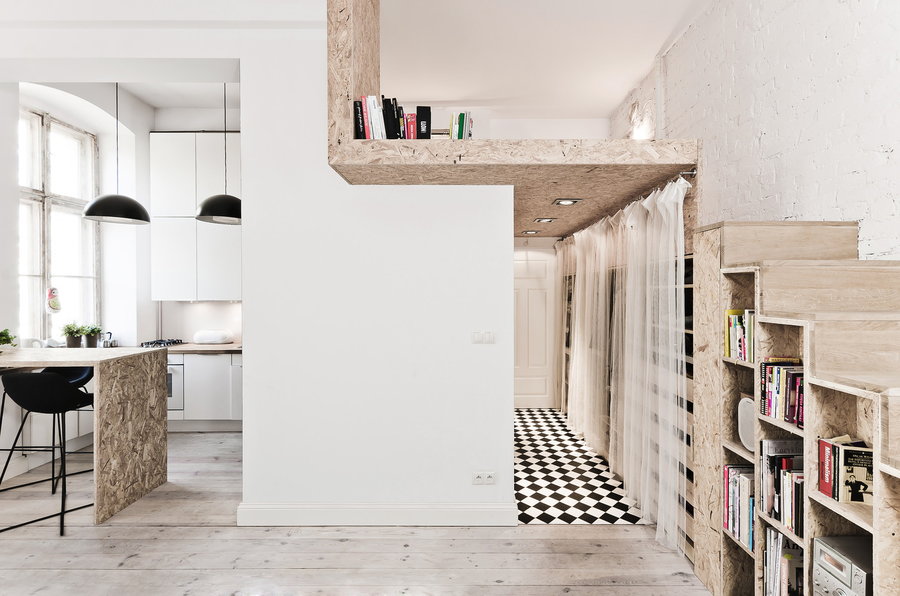 This small living space employs several easy tricks to make itself feel a whole lot bigger