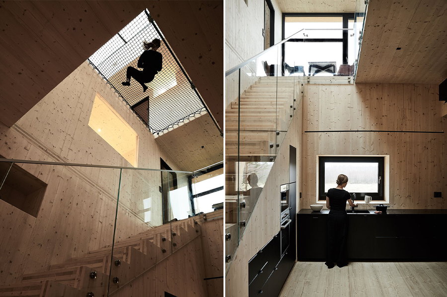 Interior shots showcase the minimalist Meteorite cabin's built-in hammock and open kitchen space.
