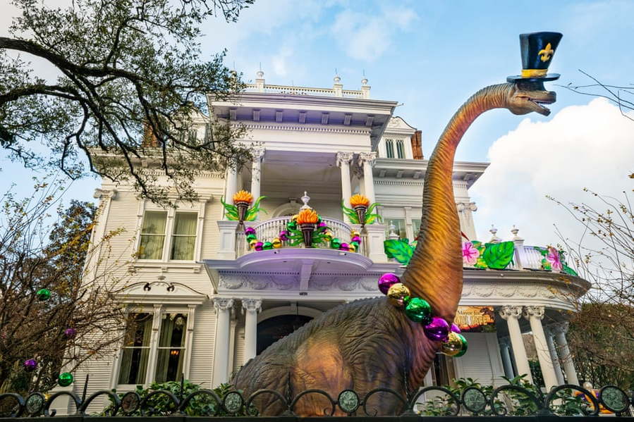 A dinosaur-themed house float created as a form of COVID-safe Mardi Gras celebration in 2021.