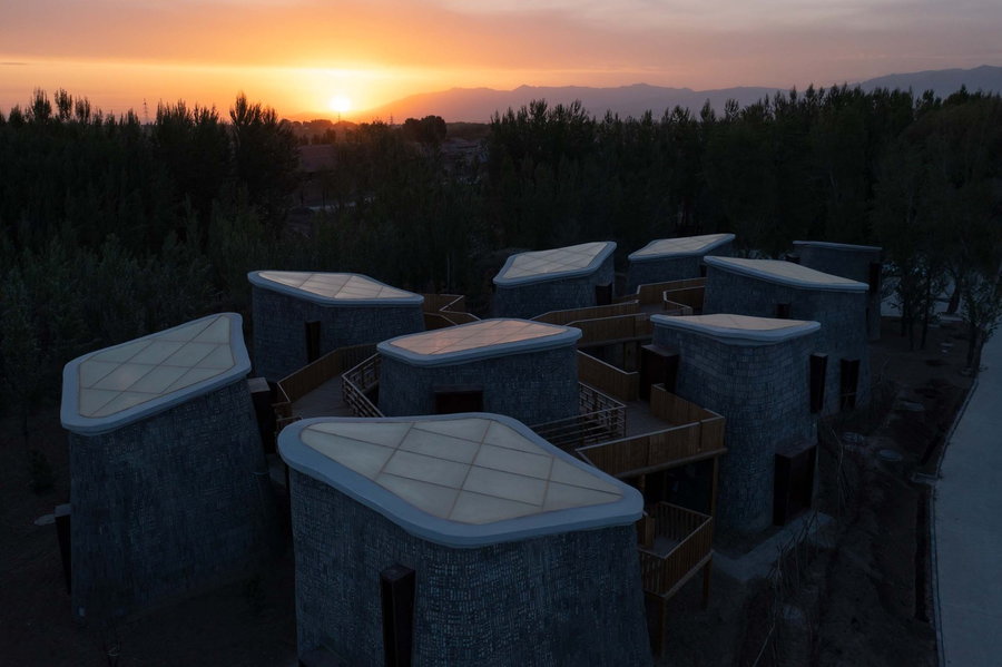 Sunset falls over the cave-inspired pods in rural China's Grotto Retreat Xyaotou.