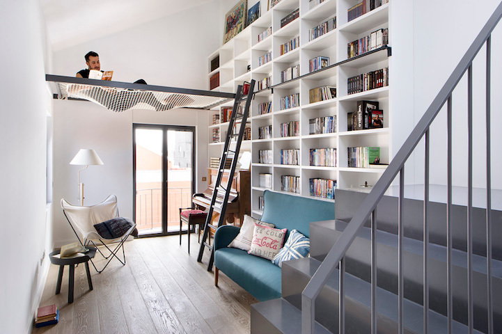 Floor-to-ceiling bookshelves  create the illusion of much higher ceilings 