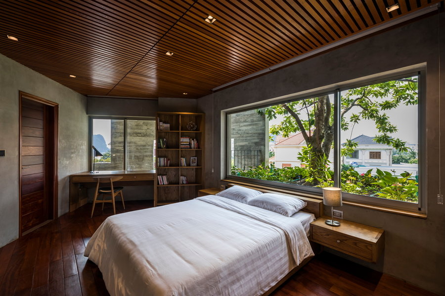 The bedrooms inside the villa feel warm, airy and of course, abundantly green. 