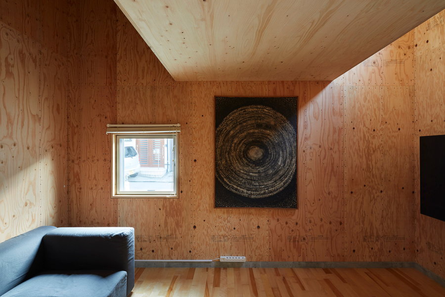 Sparse plywood lounge area inside the Alphaville Architects-designed 24-mm plywood tiny home.