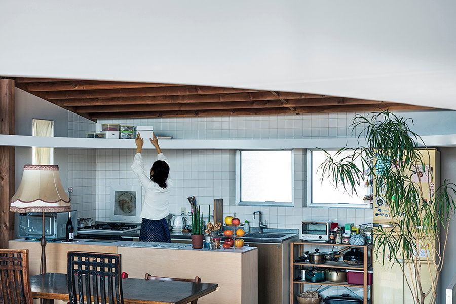 At its lowest point, the new cutout forms a useful shelf area over the home's kitchen.