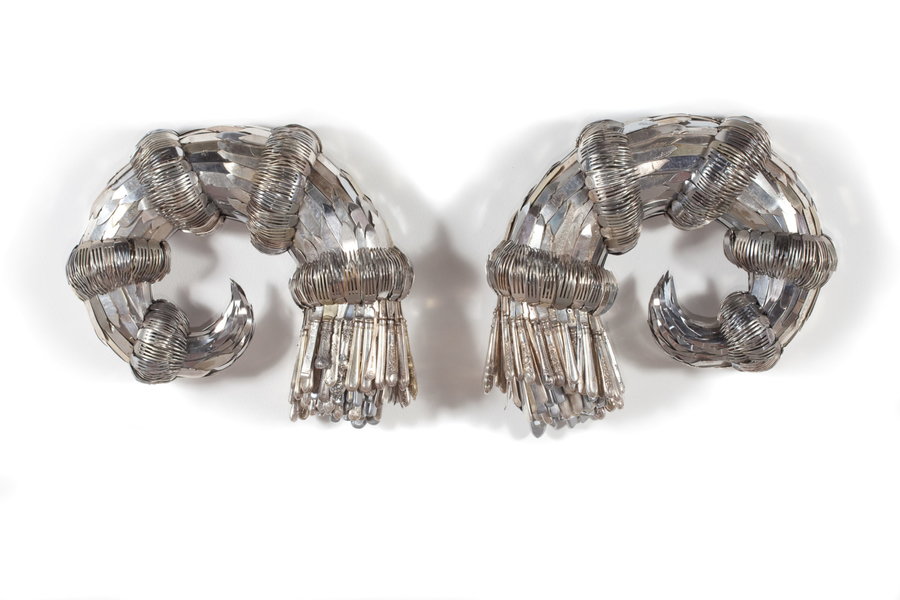 Upcycled silver horns by artist Ann Carrington.