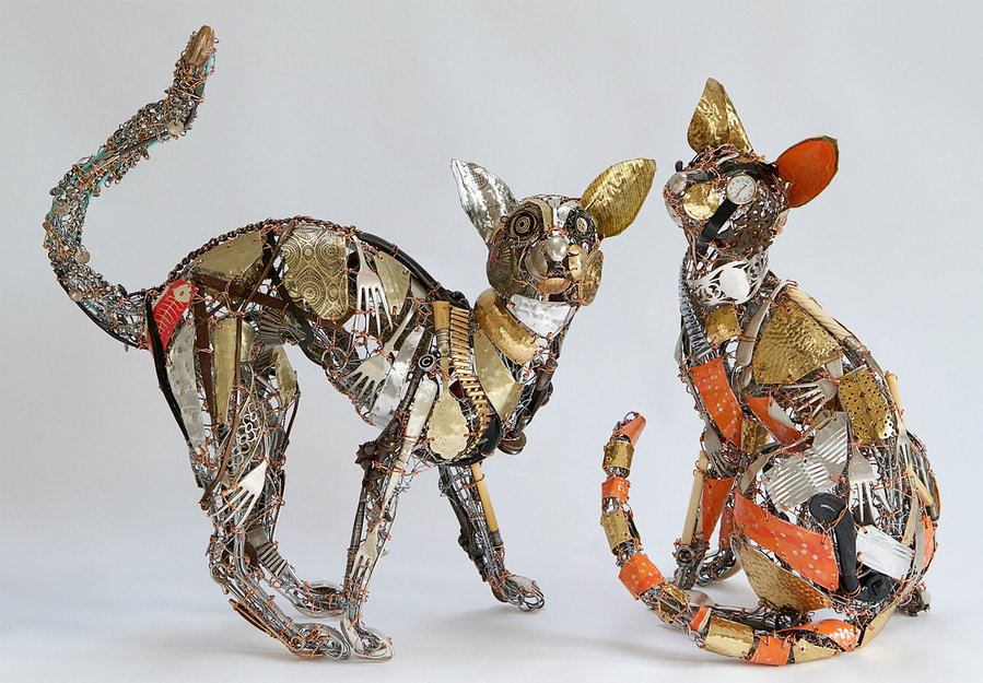 Playful upcycled metal cats by artist Barbara Franc.