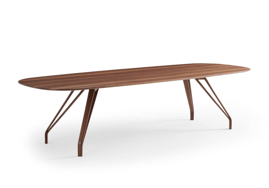 A long wooden table featured in Davis Furniture's sustainably-sourced 