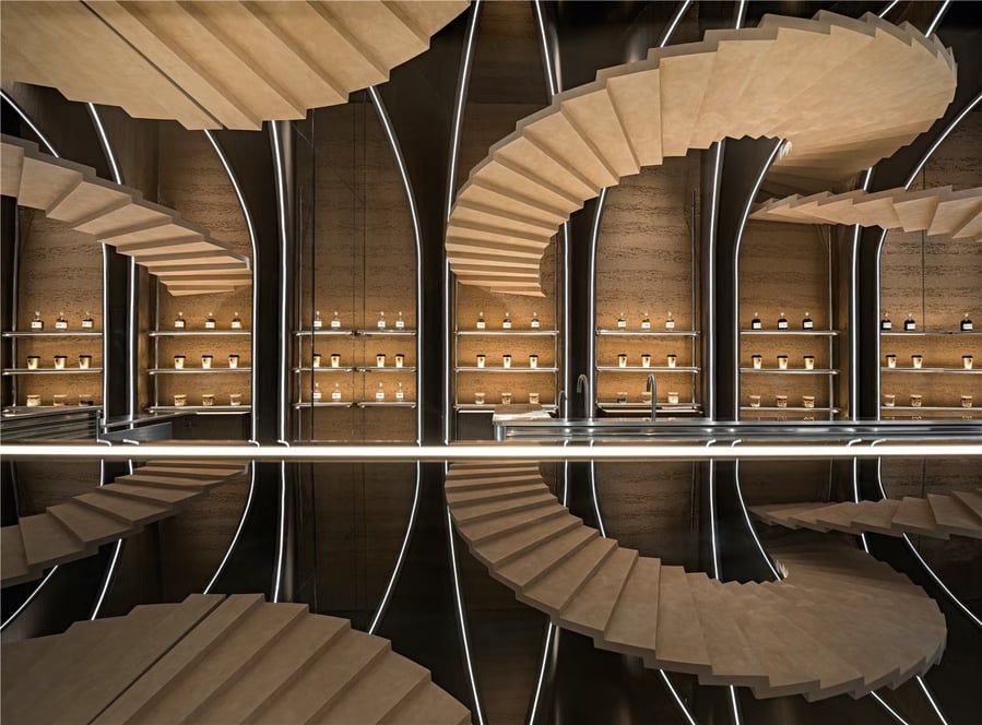 The Zhima Health store's spiraling upside staircases are reflected in shiny black surfaces below.