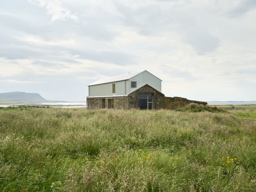 Old concrete Icelandic barn transformed into a modern abode by Studio Bua.