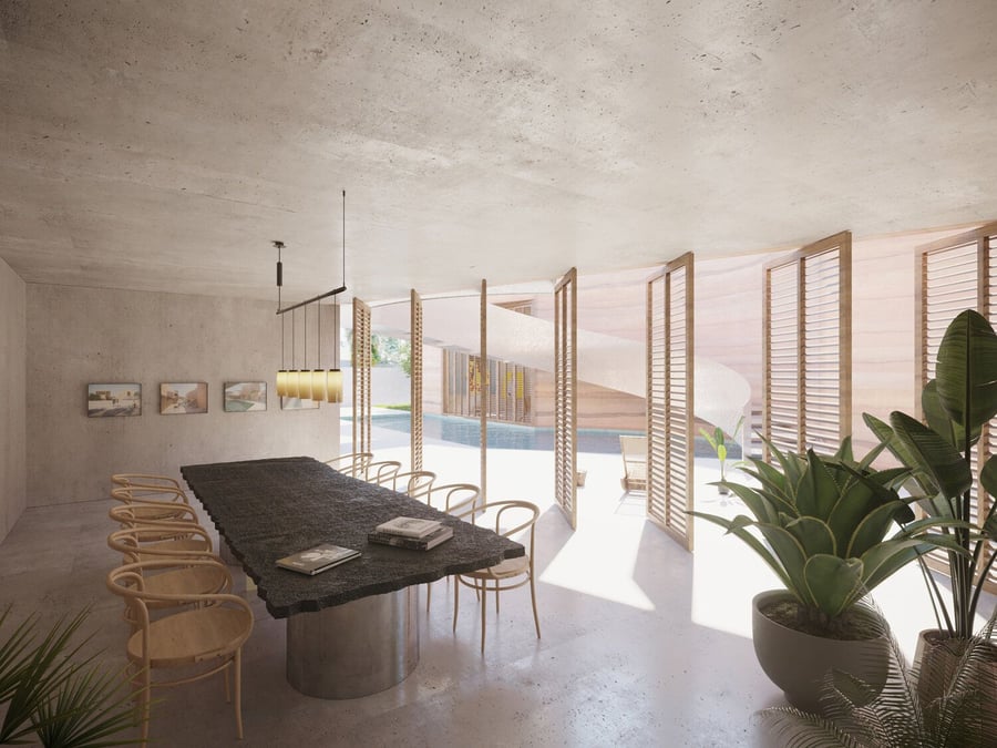 The house's dining area features operable wooden louvres that give it lots of access to fresh air and natural light. 