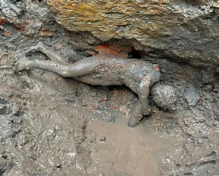 Bronze statue unearthed by archeologists from the muddy waters of the ancient San Casciano dei Bagni.