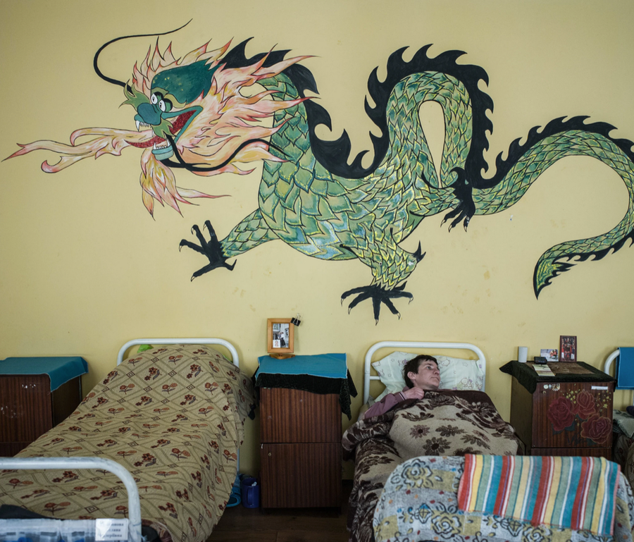 A fantastical green dragon adorns the wall of this Ukrainian women's facility. 