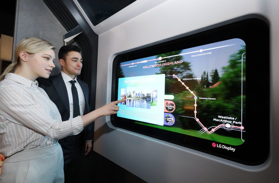 LG's Transparent OLED Display being used on a train.