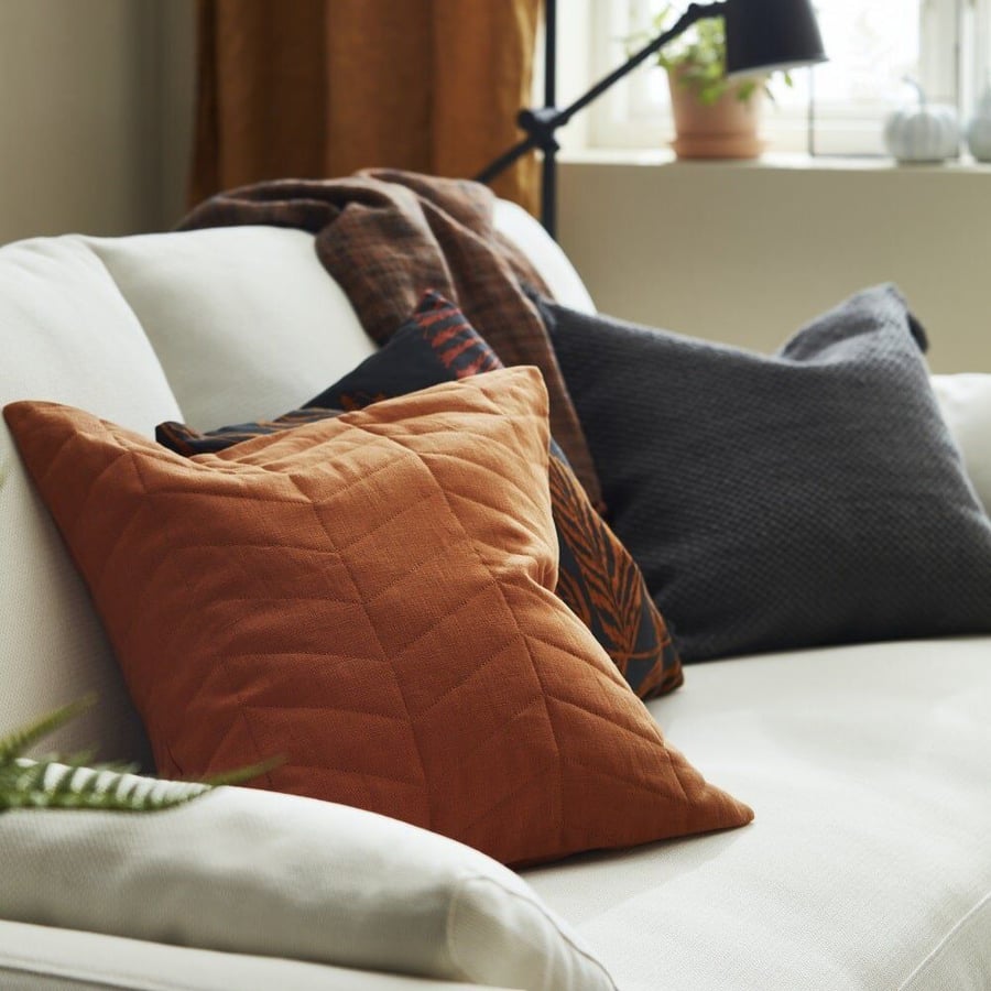 Warm oranges and browns dominate IKEA's fall 2021 throw pillows