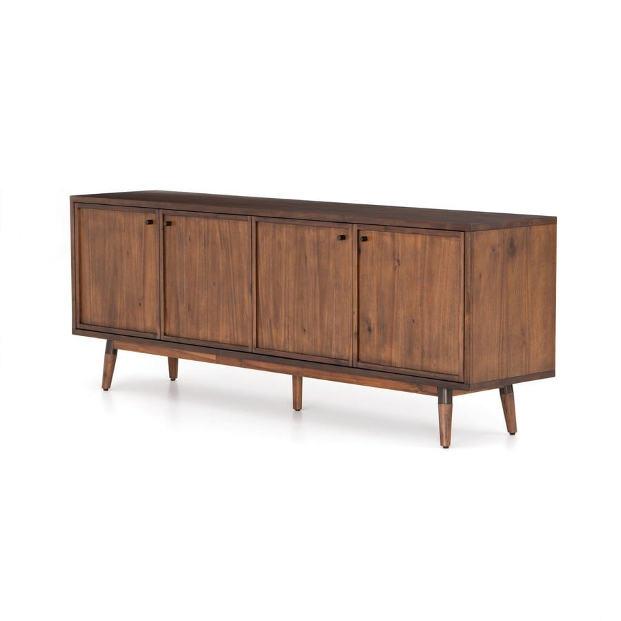 The long, low, and beautifully stained Piper Sideboard storage unit featured in Magnolia's new fall furniture collection. 