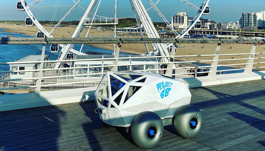 The BeachBot beach-cleaning rover picks up discarded cigarette butts as it makes its way along the shore. 